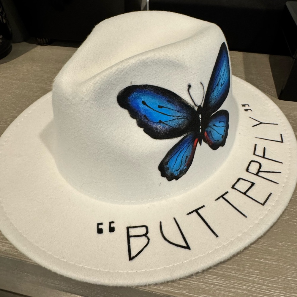 White Hat with Blue Butterfly Design